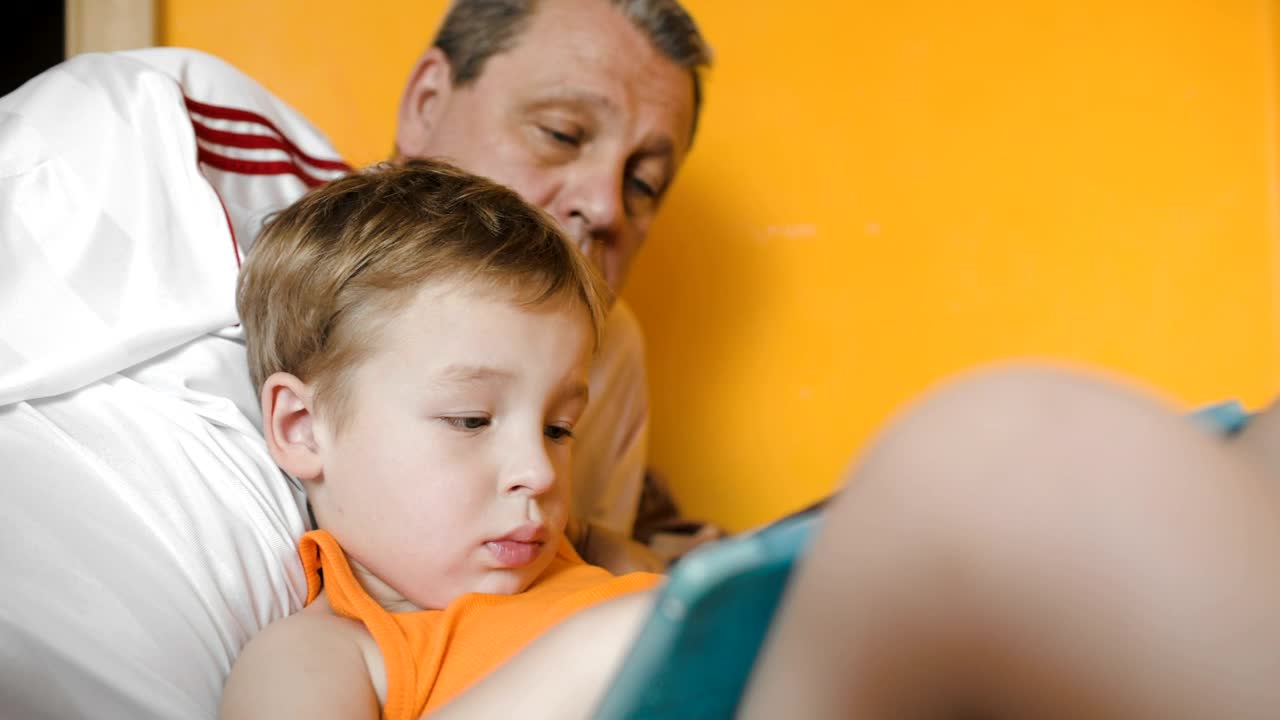 Stock Video Grandson Playing With A Tablet Live Wallpaper For PC