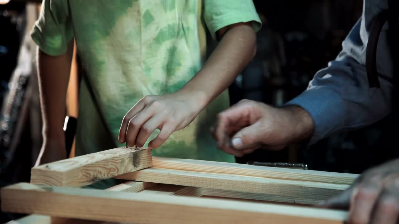 Stock Video Grandson Helping His Grandfather With Carpentry Live Wallpaper For PC