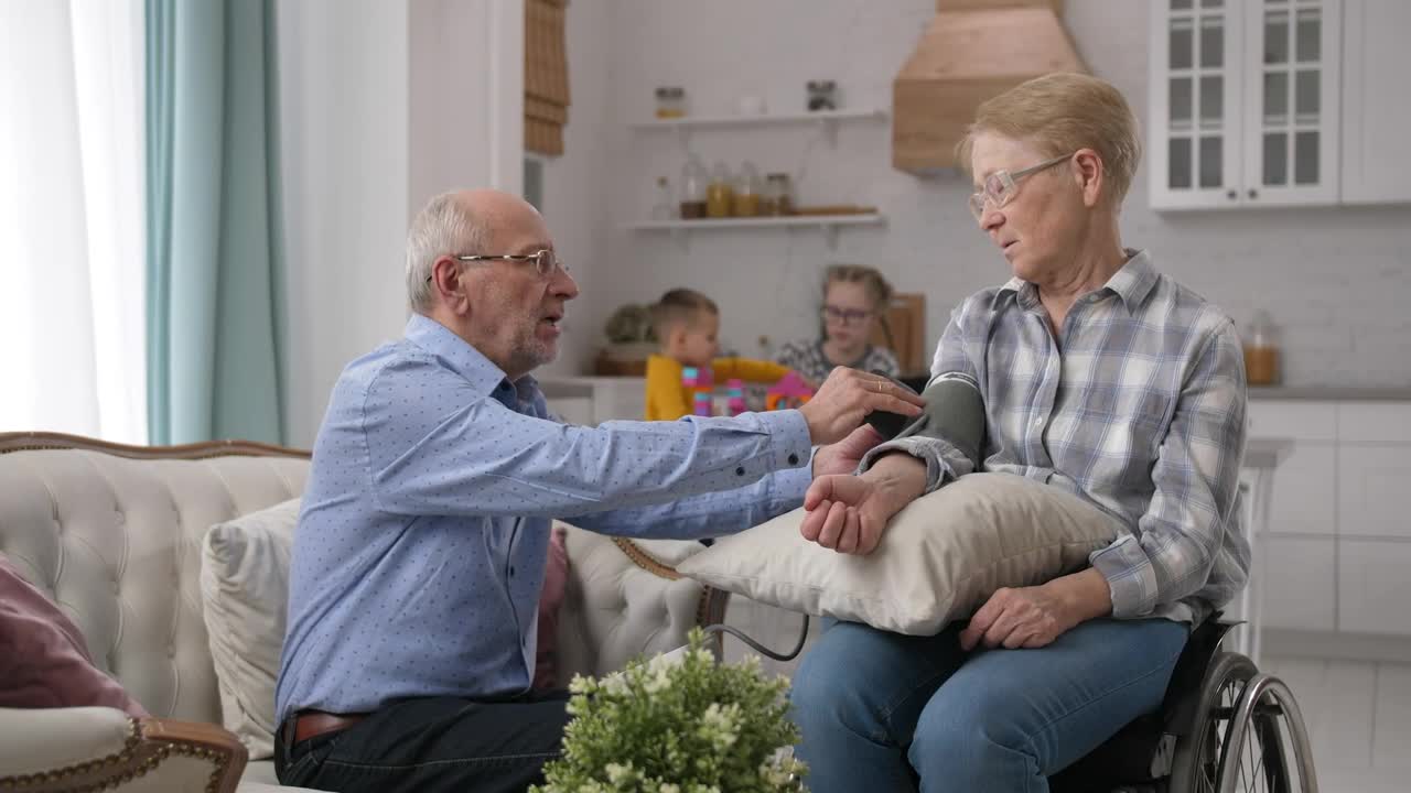 Stock Video Grandparents Checking Their Blood Pressure Live Wallpaper For PC
