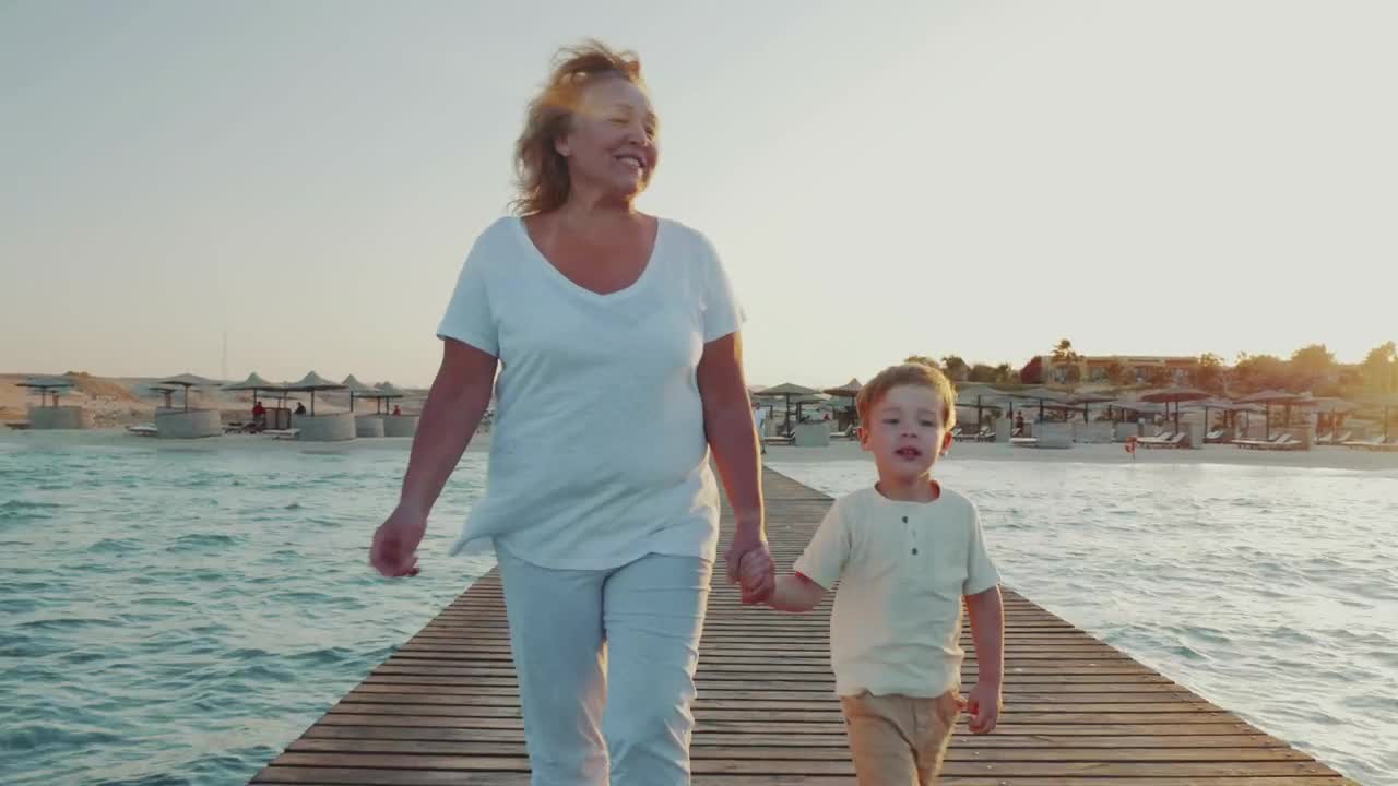Stock Video Grandmother Walking Along A Pier Live Wallpaper For PC