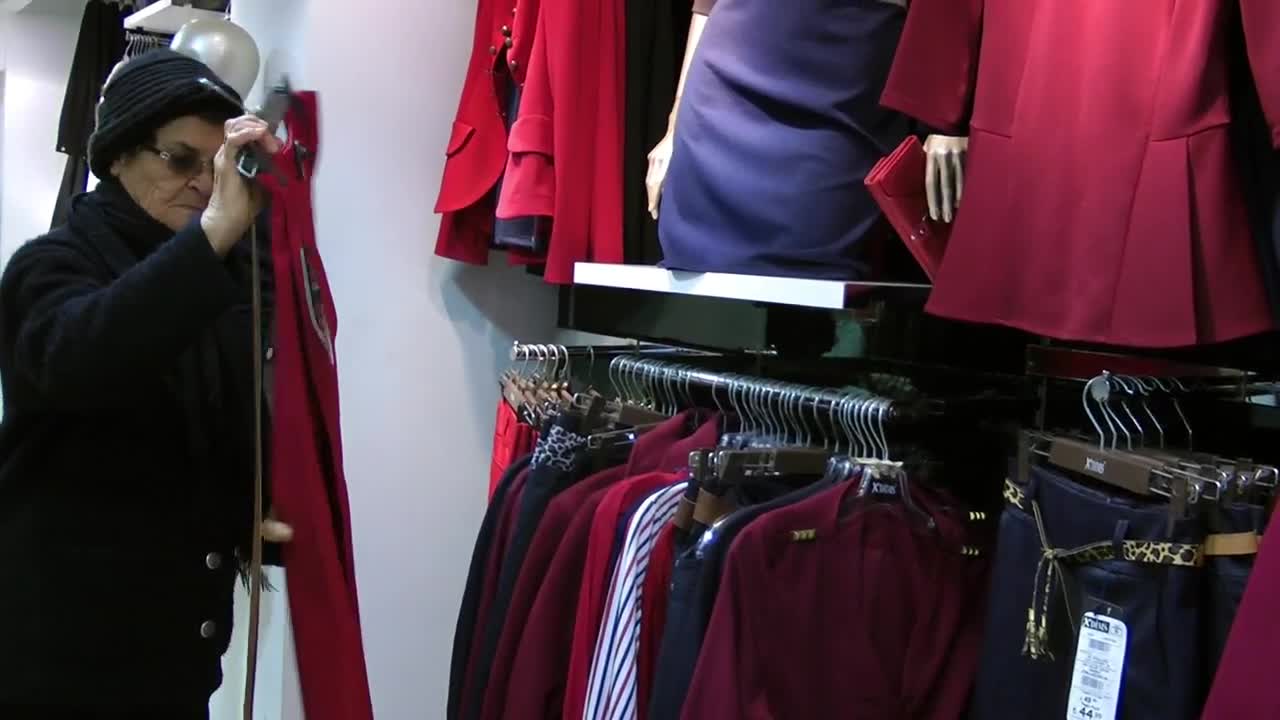 Stock Video Grandmother Shopping In A Clothing Store Live Wallpaper For PC