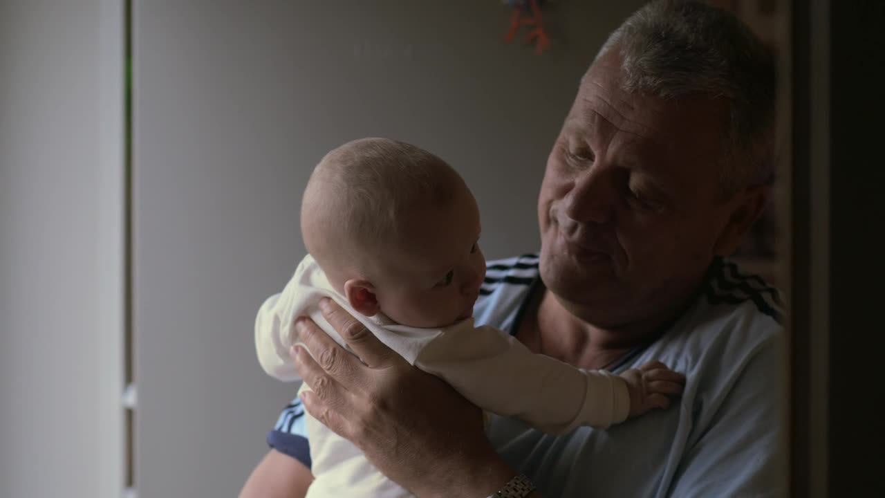 Stock Video Grandfather With A Newborn Live Wallpaper For PC