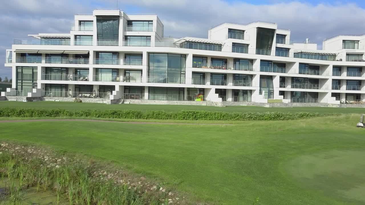 Stock Video Golf Cart Driving By A Hotel Live Wallpaper For PC