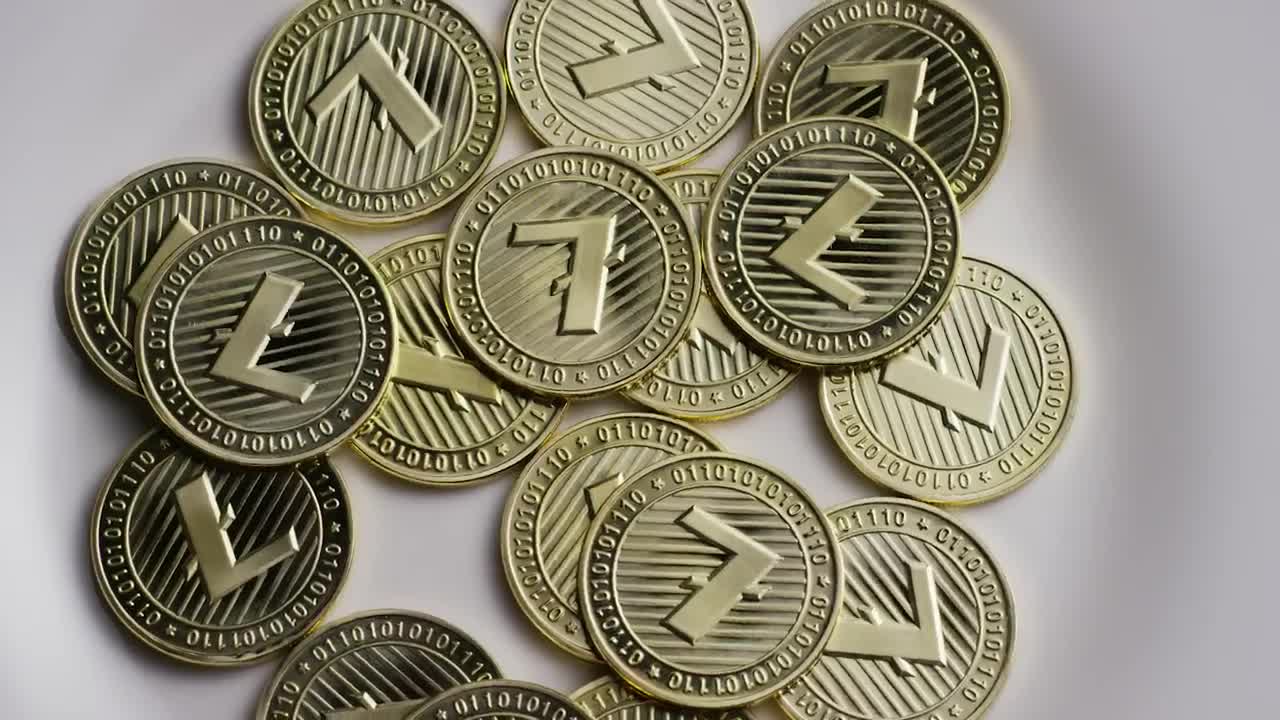 Stock Video Golden Litecoin Coins Slowly Spinning Live Wallpaper For PC