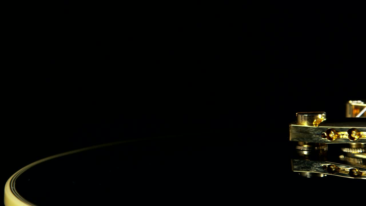 Stock Video Golden Guitar Strings Against A Dark Room Live Wallpaper For PC