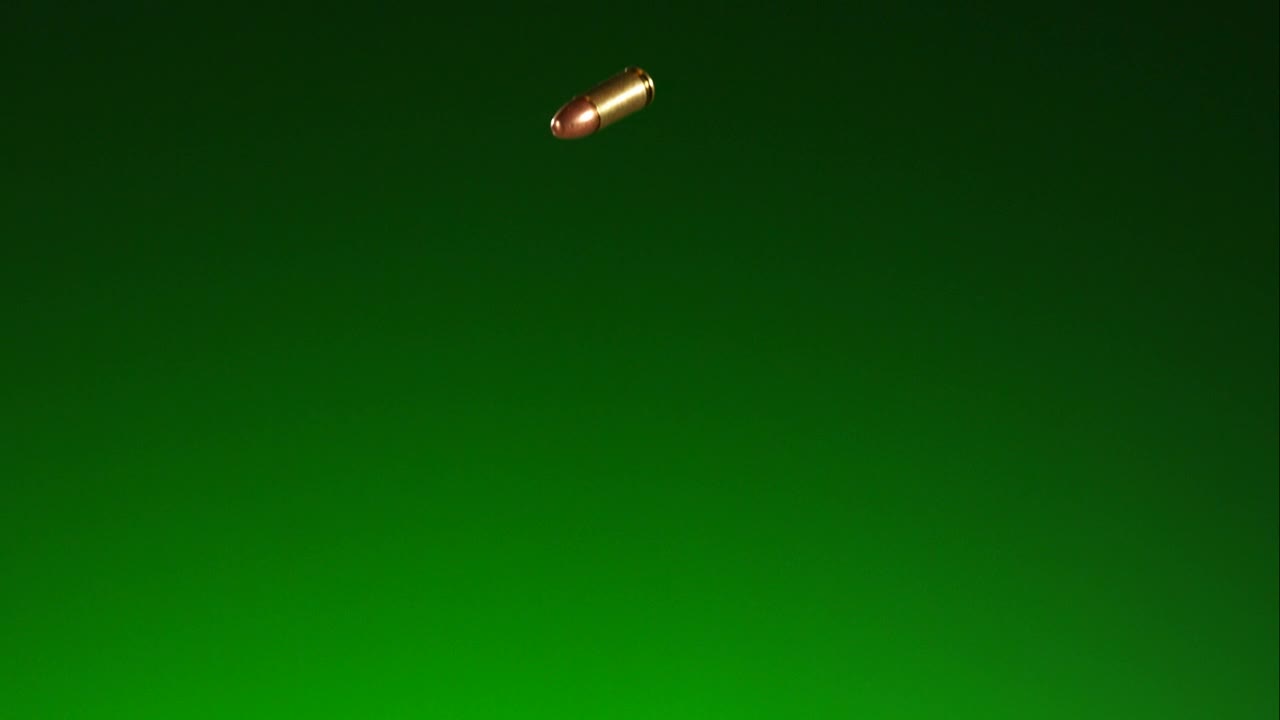 Stock Video Golden Falling Bullets With Green Background Live Wallpaper For PC