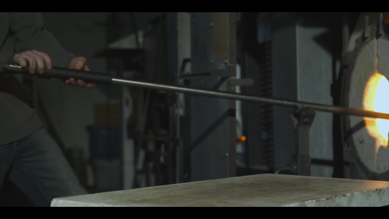 Stock Video Glazier Taking Glass Out Of A Furnace And Shaping It Live Wallpaper For PC