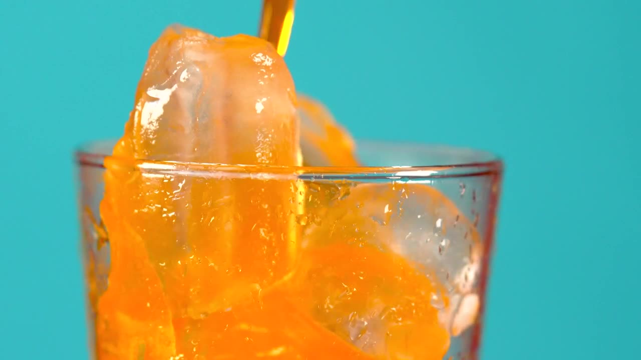 Stock Video Glass With Ice With Orange Soda Live Wallpaper For PC