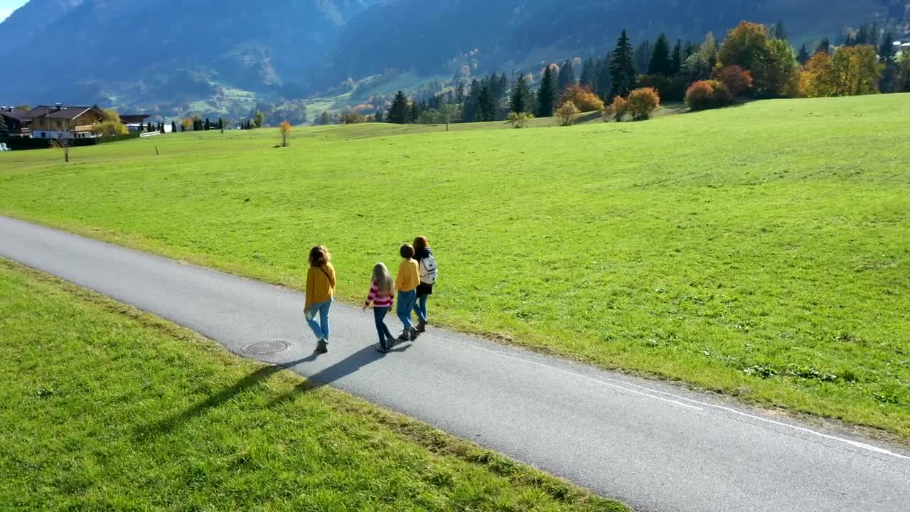 Stock Video Girls Walking On A Road Between Grass Fields Live Wallpaper For PC