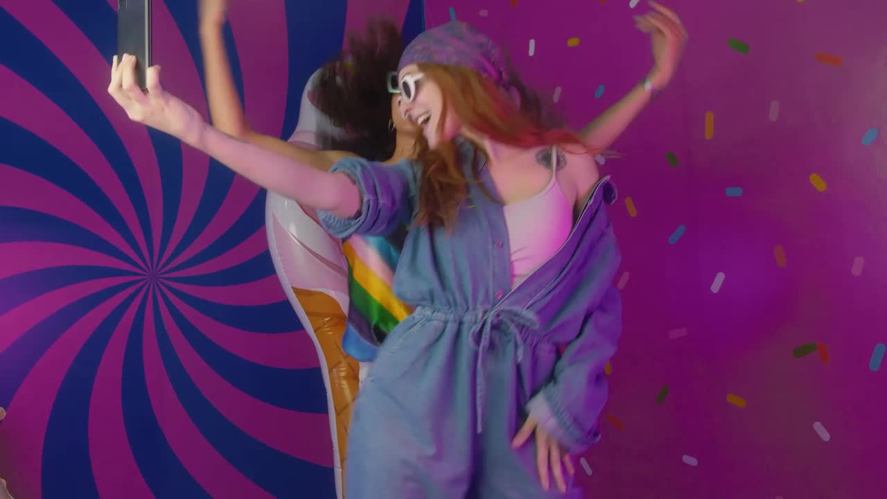 Stock Video Girls Recording Themselves Dancing In A Colorful Place Live Wallpaper For PC