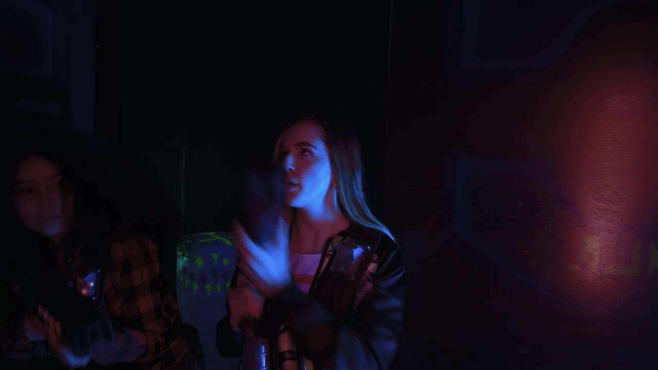 Stock Video Girls Looking For Opponents In Laser Gotcha Live Wallpaper For PC