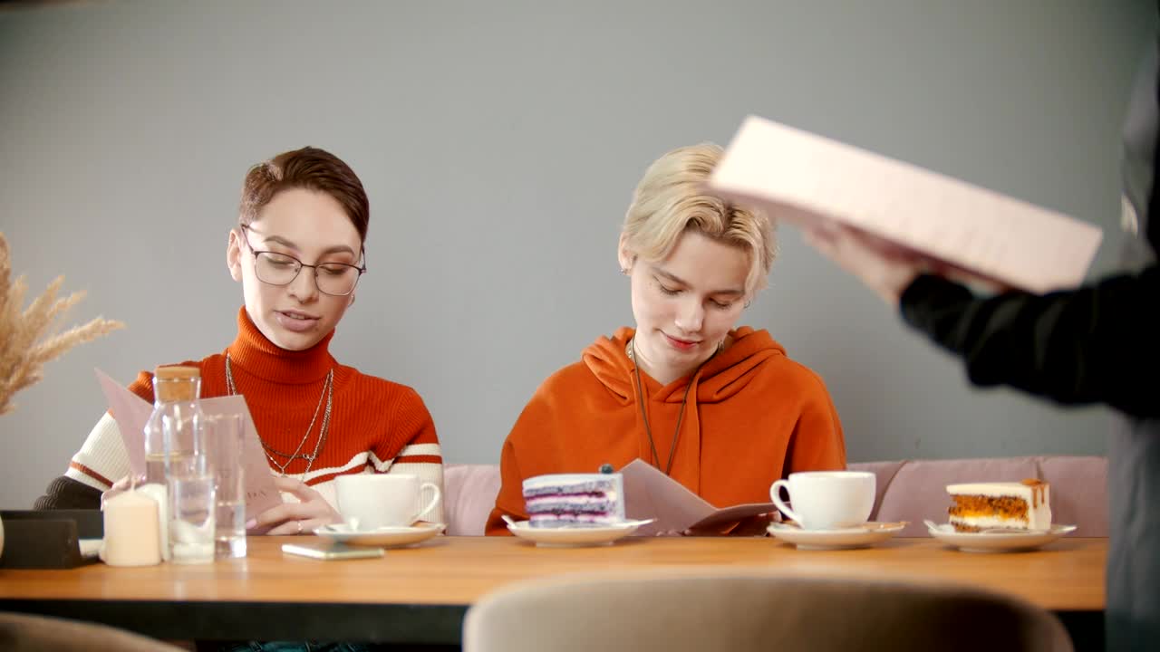 Stock Video Girls Giving The Menu To The Waiter Live Wallpaper For PC