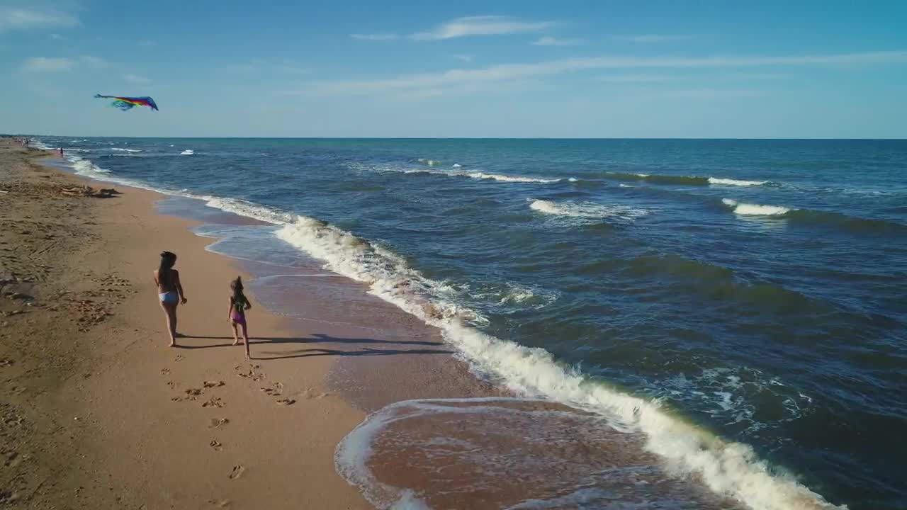 Stock Video Girls Flying A Kite On The Beach Live Wallpaper For PC