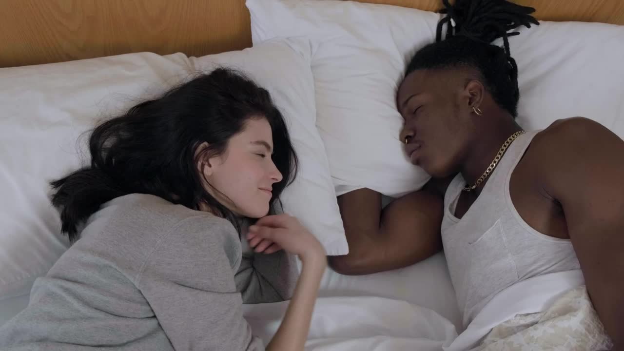 Stock Video Girlfriend Caresses Her Boyfriends Face Lying On A Bed Live Wallpaper For PC