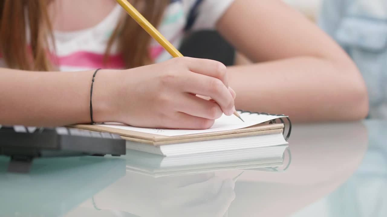 Stock Video Girl Writes Notes While Learning In Classroom Live Wallpaper For PC