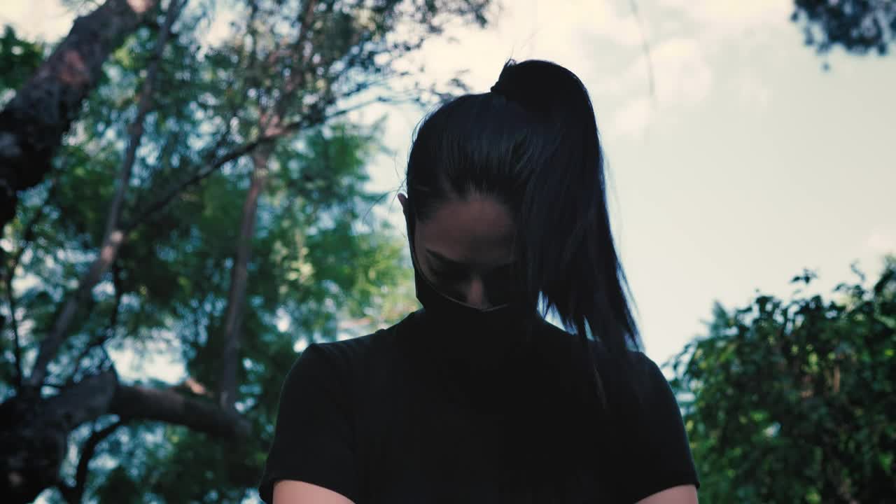 Stock Video Girl With Mask Warming Up And Stretching In Nature Live Wallpaper For PC