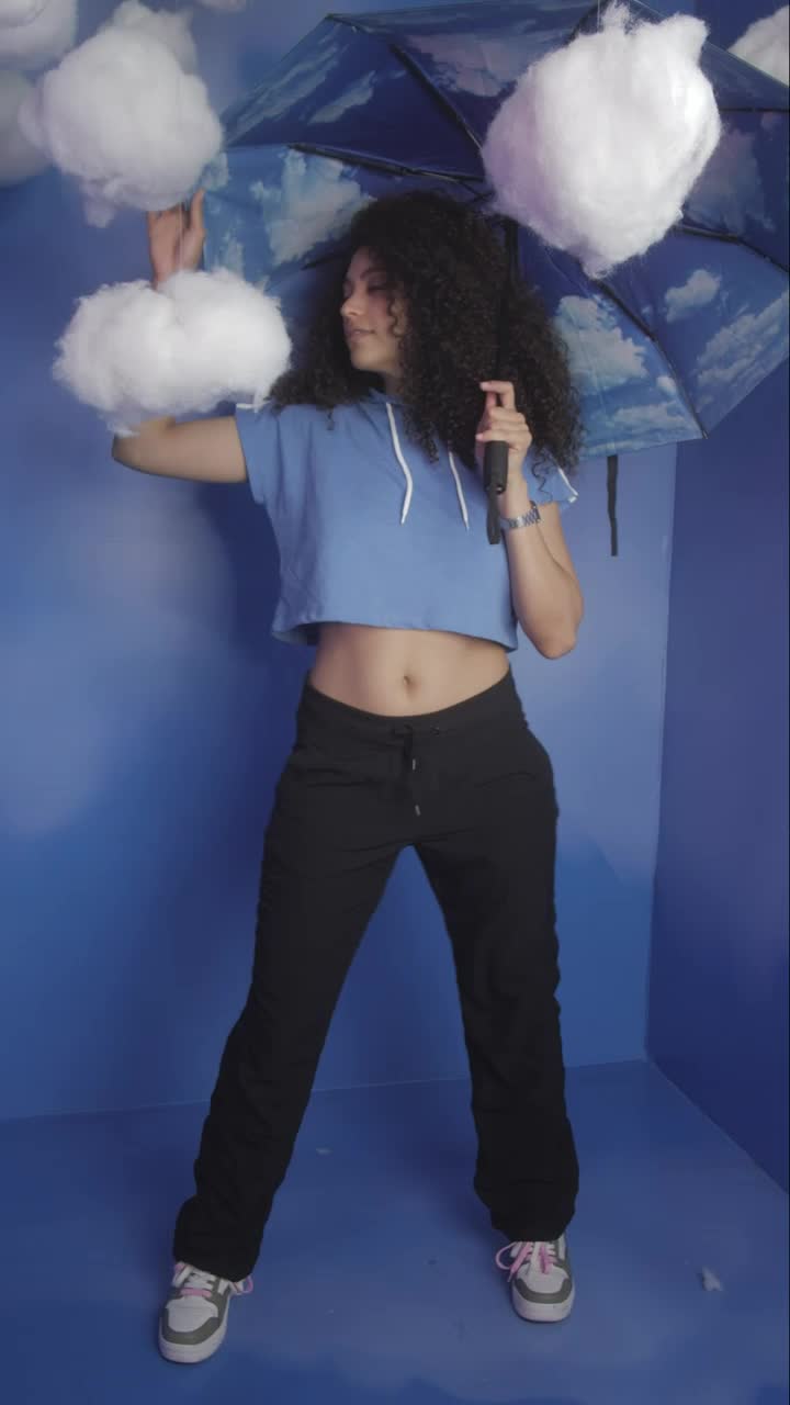 Stock Video Girl With An Umbrella Among Cotton Clouds Live Wallpaper For PC