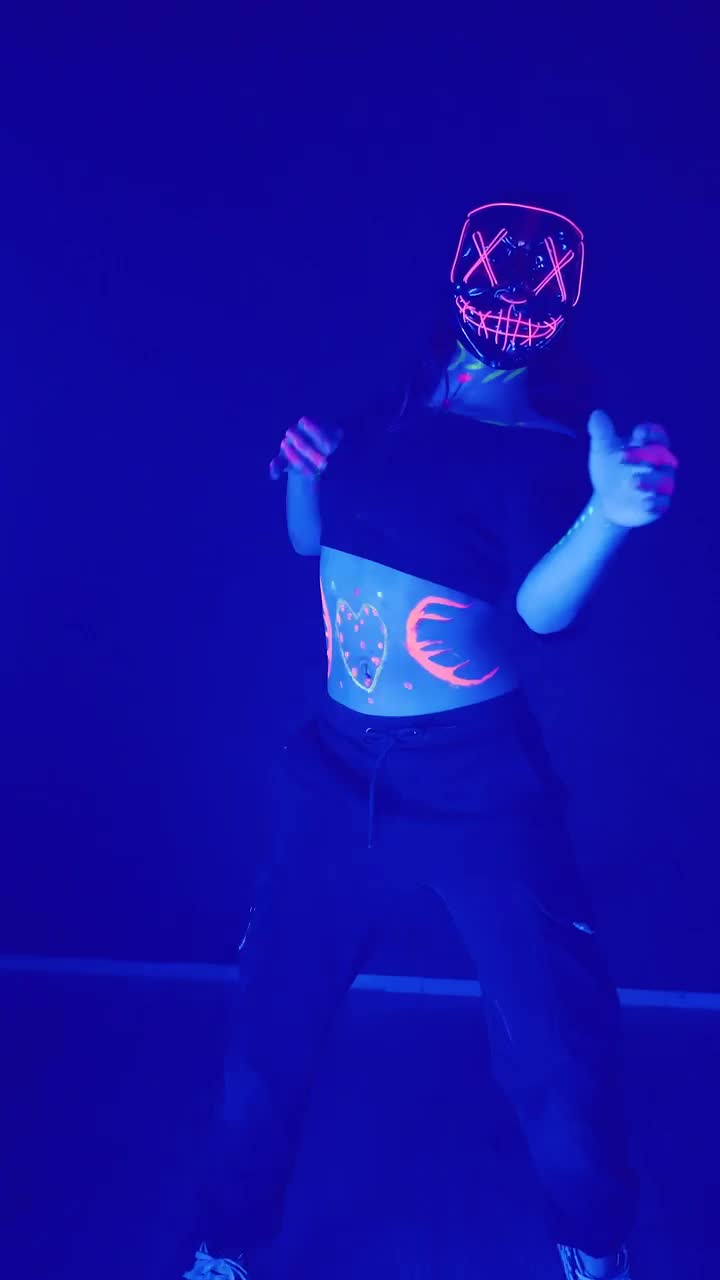 Stock Video Girl With A Mask With Lights Dancing Under Party Lights Live Wallpaper For PC