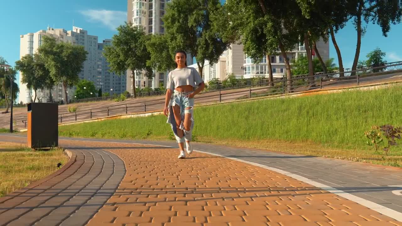 Stock Video Girl Walking Through A Park On A Sunny Day Live Wallpaper For PC