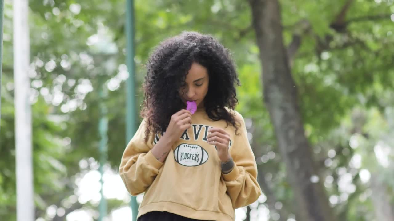 Stock Video Girl Walking In A Park Smelling A Bougainvillea Live Wallpaper For PC