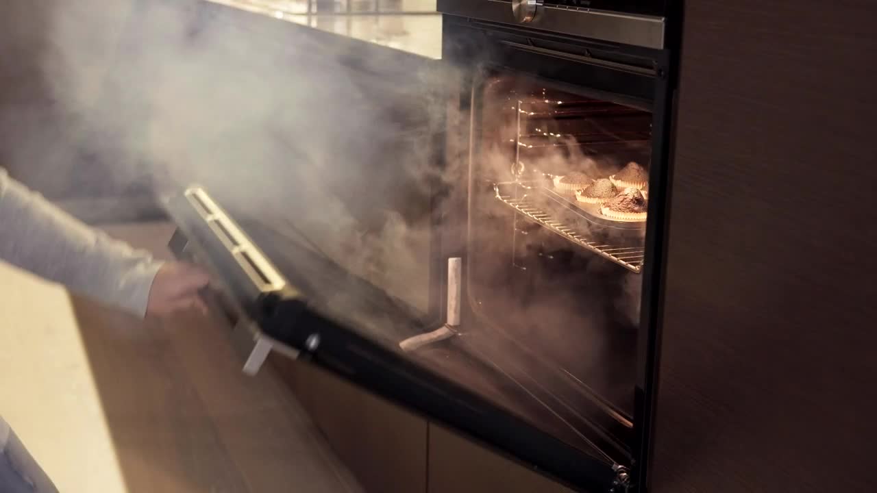 Stock Video Girl Taking Burnt Food Out Of An Oven Live Wallpaper For PC
