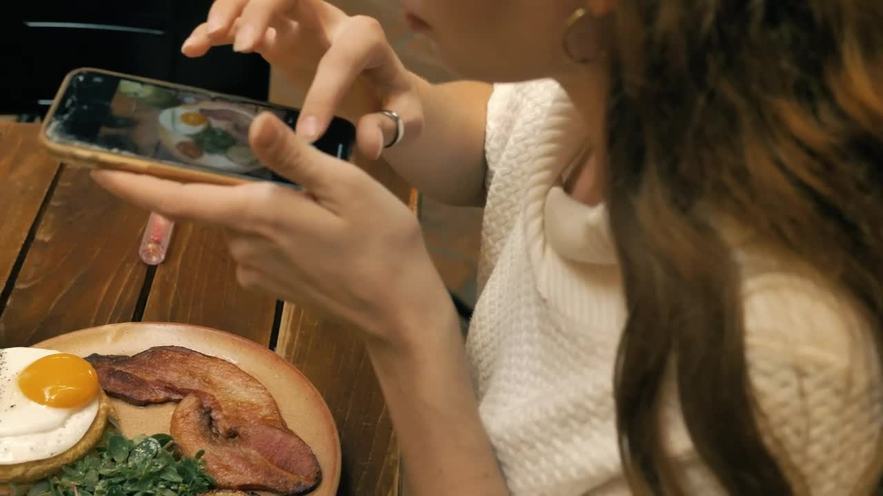 Stock Video Girl Taking A Picture Of Her Food In A Restaurant Live Wallpaper For PC