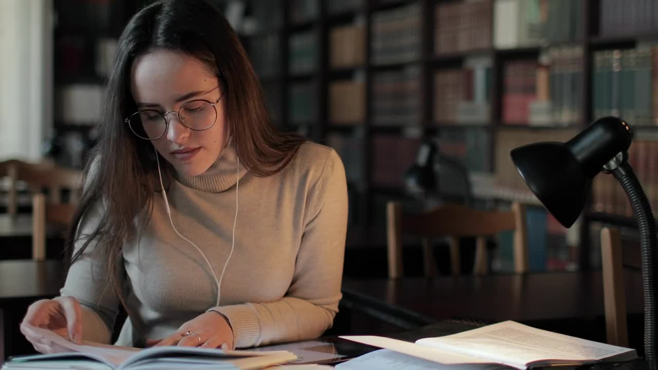 Stock Video Girl Studies High School Education In Library Live Wallpaper For PC