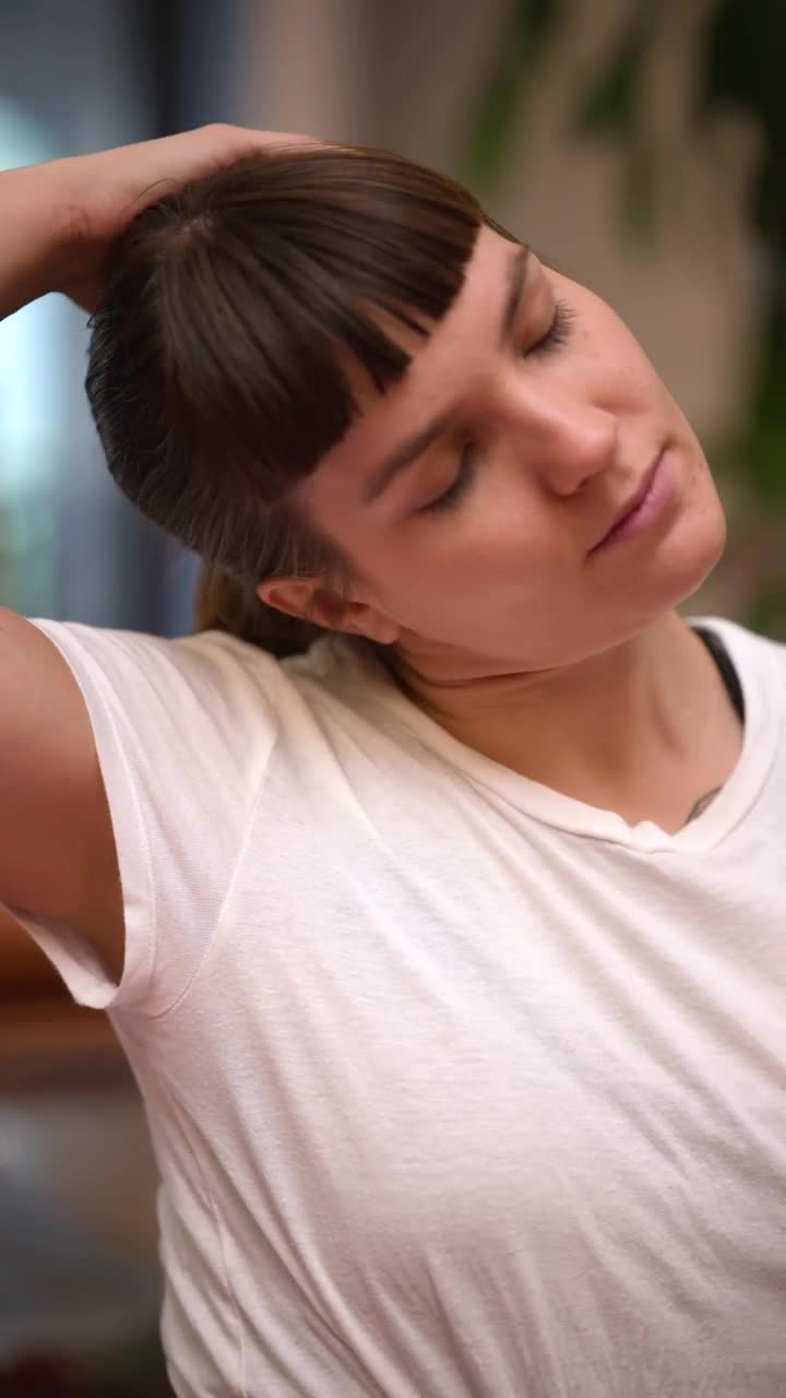 Stock Video Girl Stretching Her Neck Before Practicing Yoga Live Wallpaper For PC