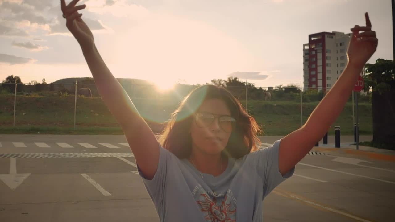 Stock Video Girl Skating Down The Street In A Close Shot Live Wallpaper For PC