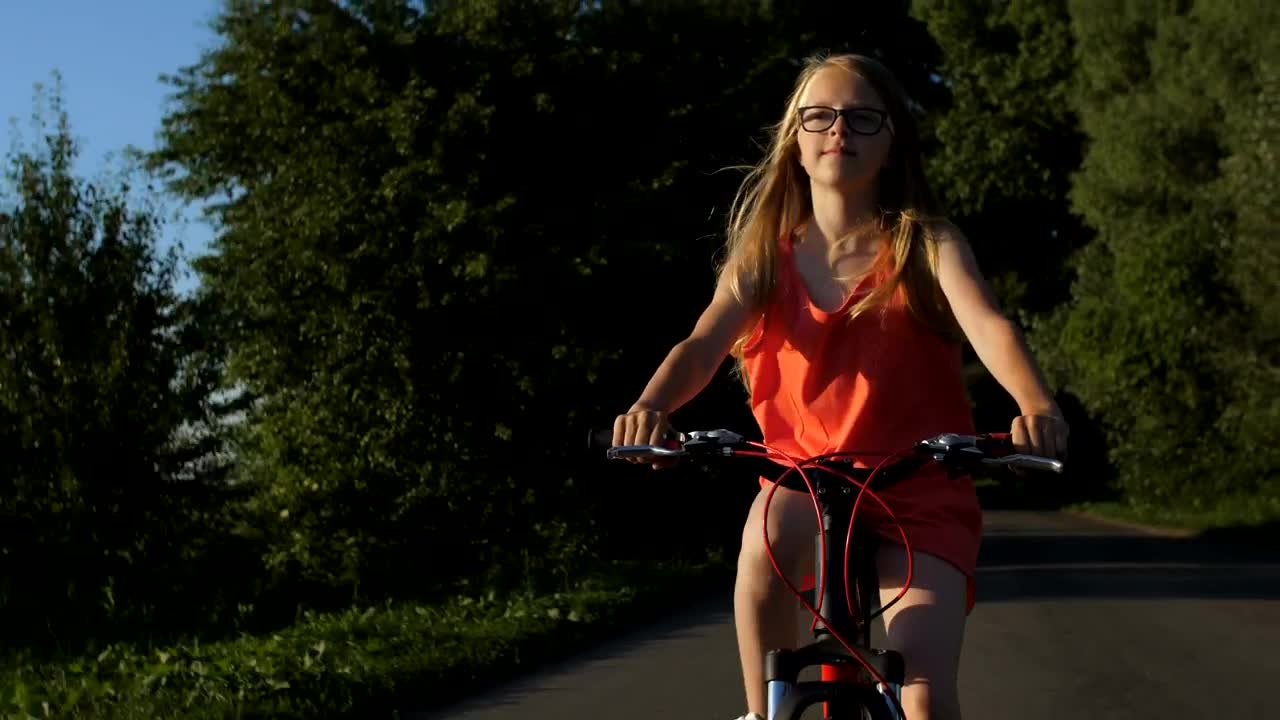 Stock Video Girl Riding A Bike On A Path In Nature Live Wallpaper For PC