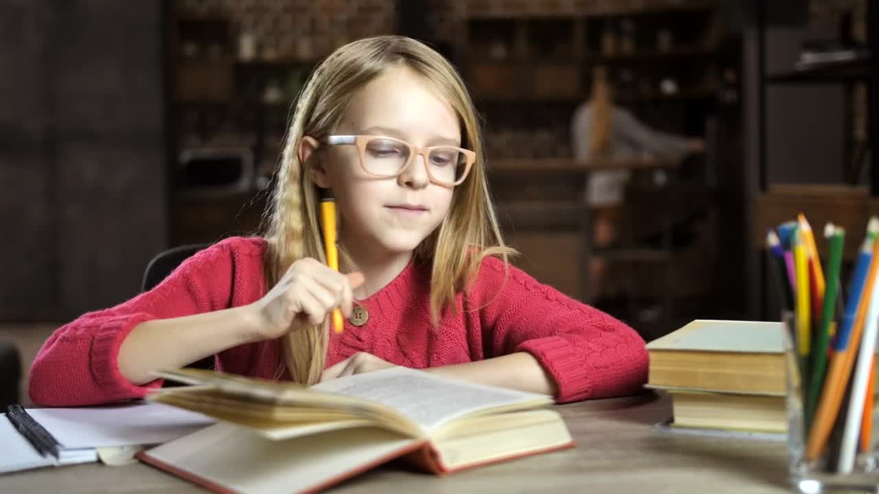 Stock Video Girl Reading A Book While Writing Live Wallpaper For PC