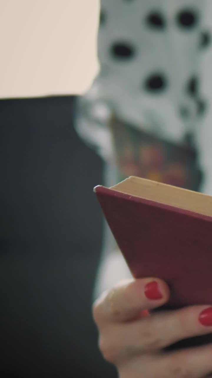 Stock Video Girl Reading A Book In A Shot Close To Her Live Wallpaper For PC