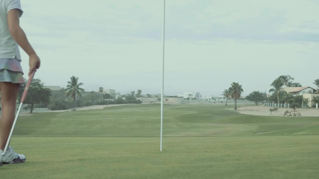 Stock Video Girl Pics A Golf Ball From The Hole Live Wallpaper For PC