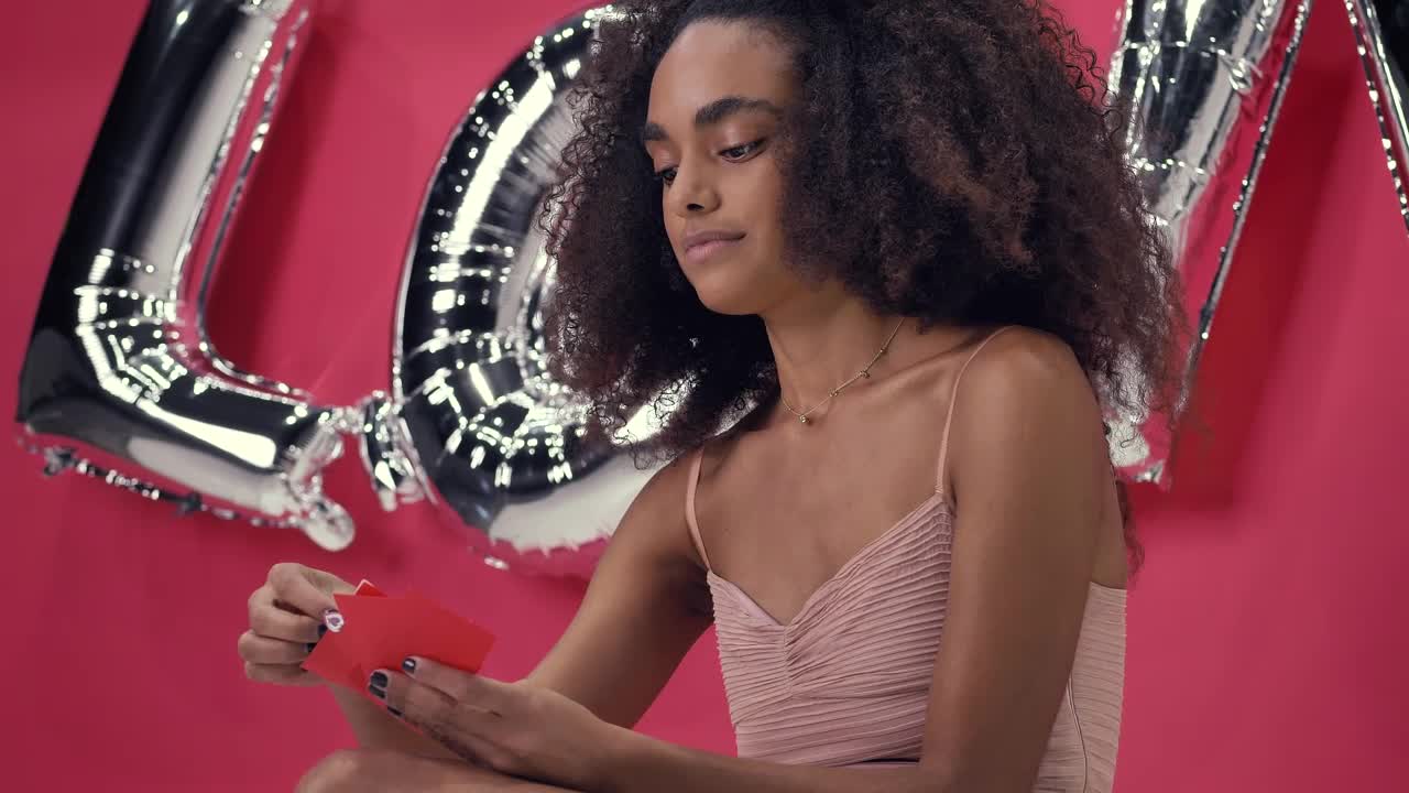 Stock Video Girl Opening A Letter Excited And Captivated On Valentines Day Live Wallpaper For PC