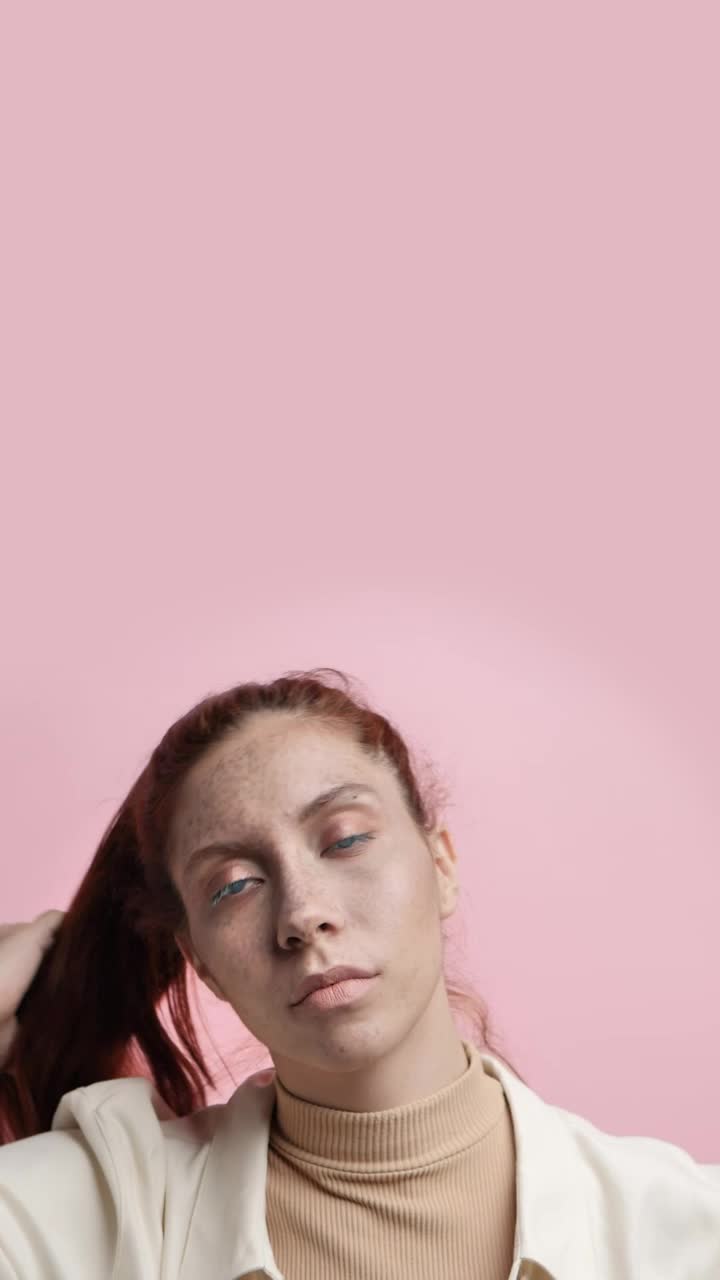 Stock Video Girl Modeling Captivatingly On A Pink Background Live Wallpaper For PC