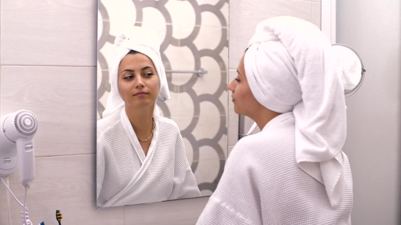 Stock Video Girl Looking And Touching Her Face In A Mirror Live Wallpaper For PC