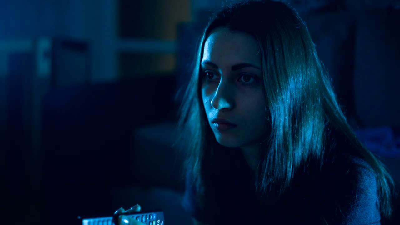 Stock Video Girl In The Dark Changing Channels On Her Tv Live Wallpaper For PC