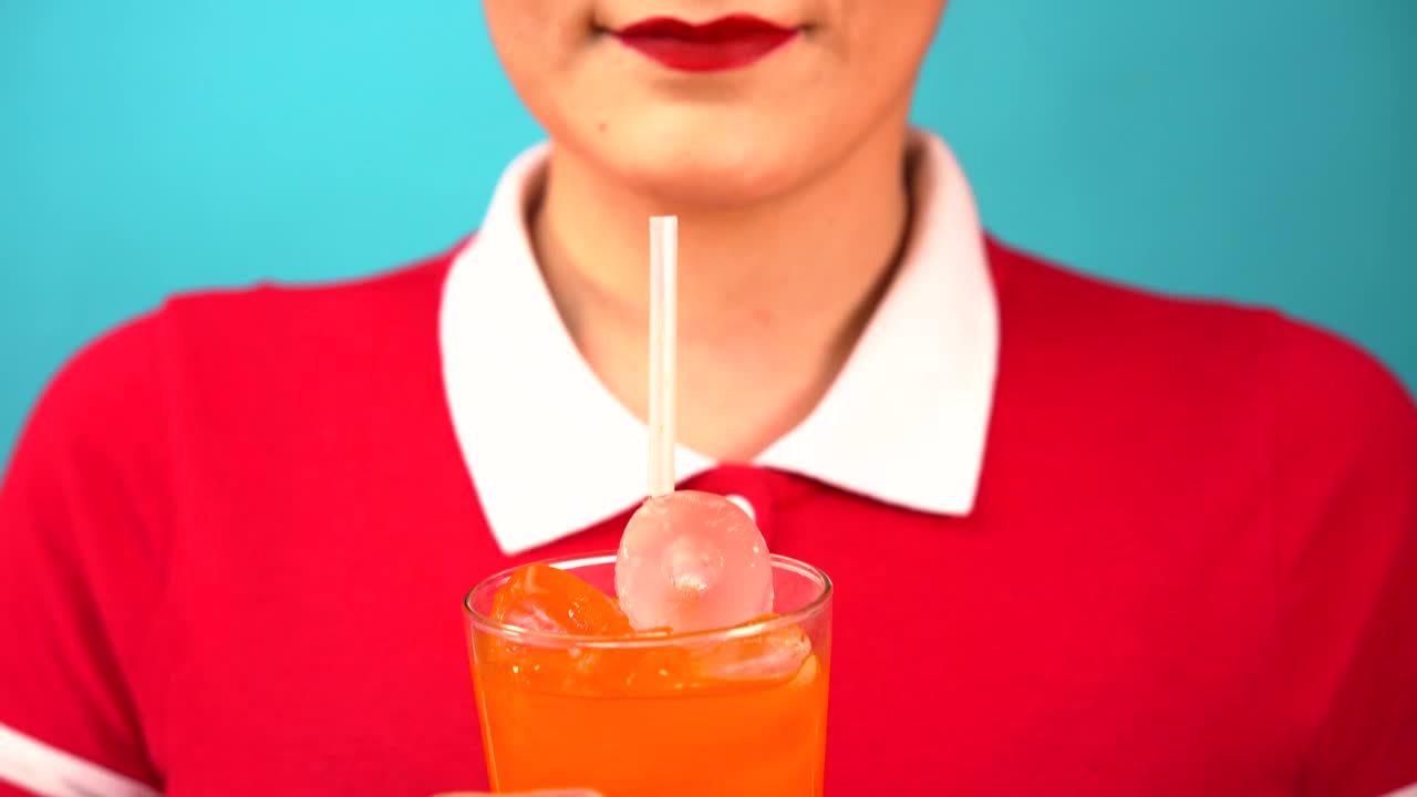 Stock Video Girl In Red Uniform Drinking Soda Live Wallpaper For PC