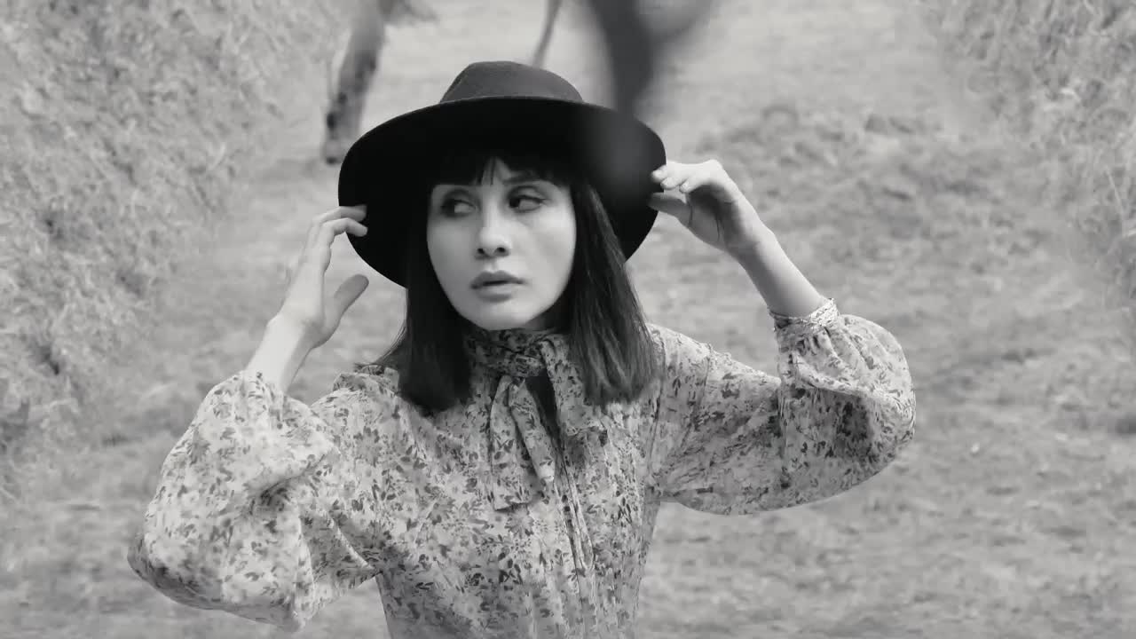 Stock Video Girl In A Forest Arranging Her Hat In Black And Live Wallpaper For PC