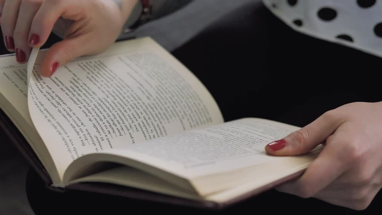 Stock Video Girl Holding A Book With Her Hands In Her Lap Live Wallpaper For PC