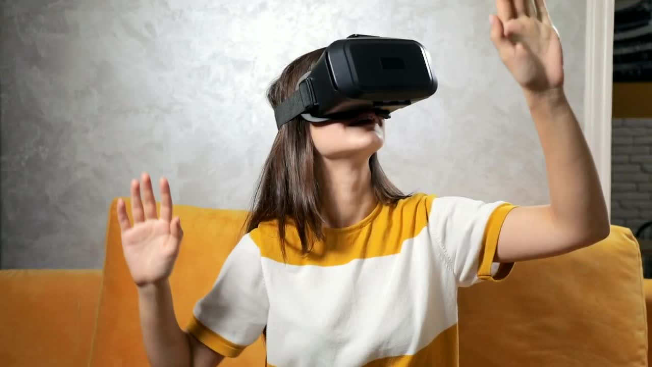 Stock Video Girl Experiences Vr Gaming Headset On Sofa Live Wallpaper For PC