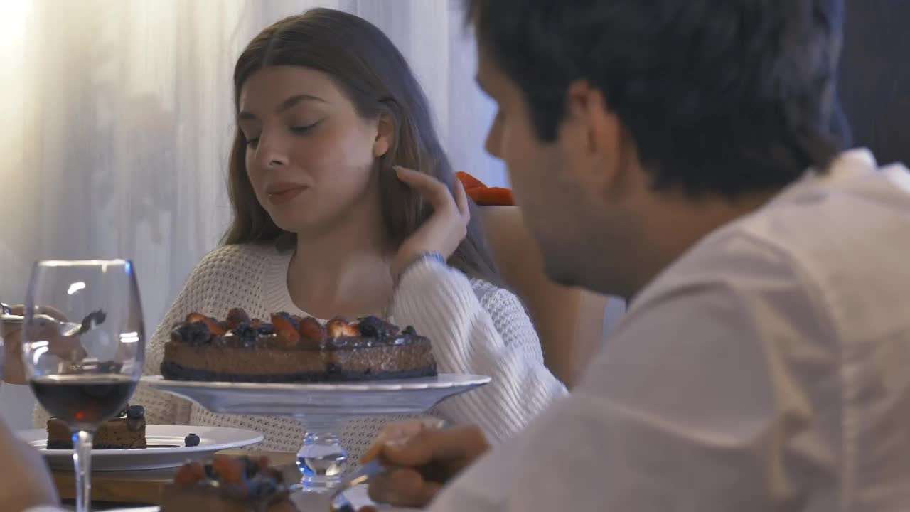 Stock Video Girl Eating At A Christmas Dinner With Friends Live Wallpaper For PC