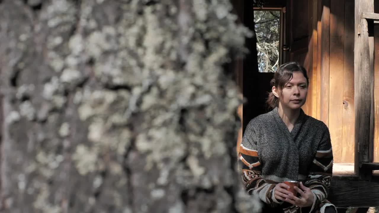 Stock Video Girl Drinking From Mug On Steps Of A Wood Cabin Live Wallpaper For PC