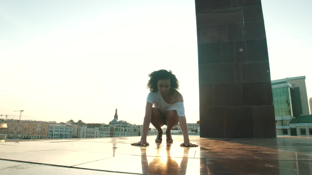 Stock Video Girl Dancing Contemporary Dance On Top Of A City Live Wallpaper For PC