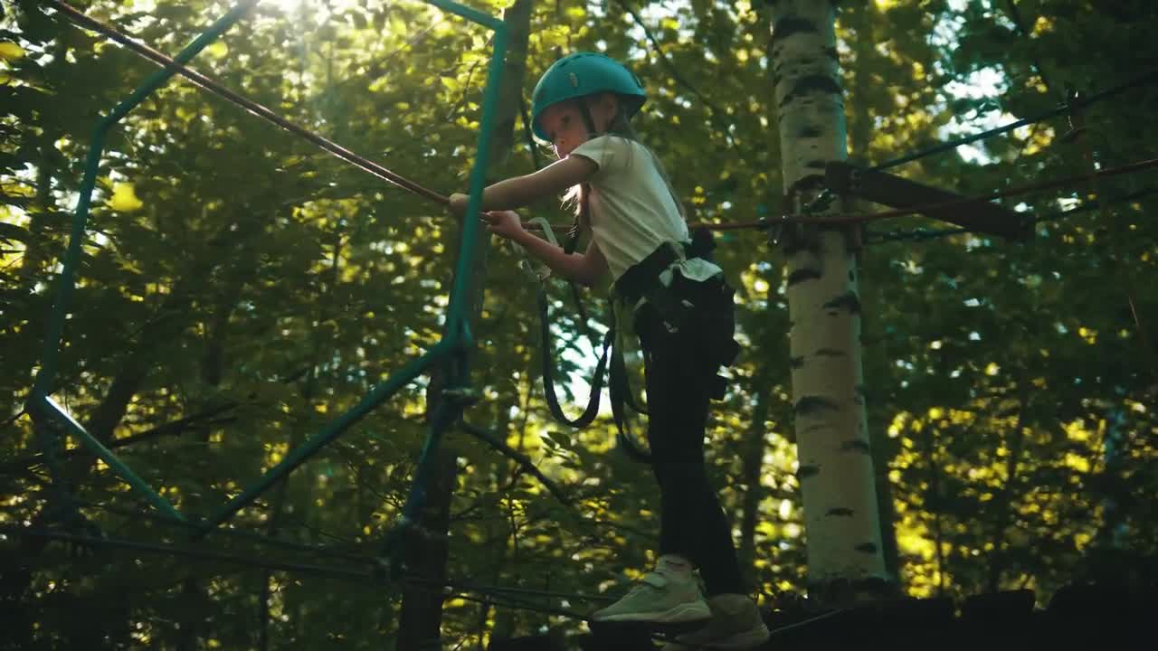 Stock Video Girl Crossing The Ropes In The Woods Live Wallpaper For PC
