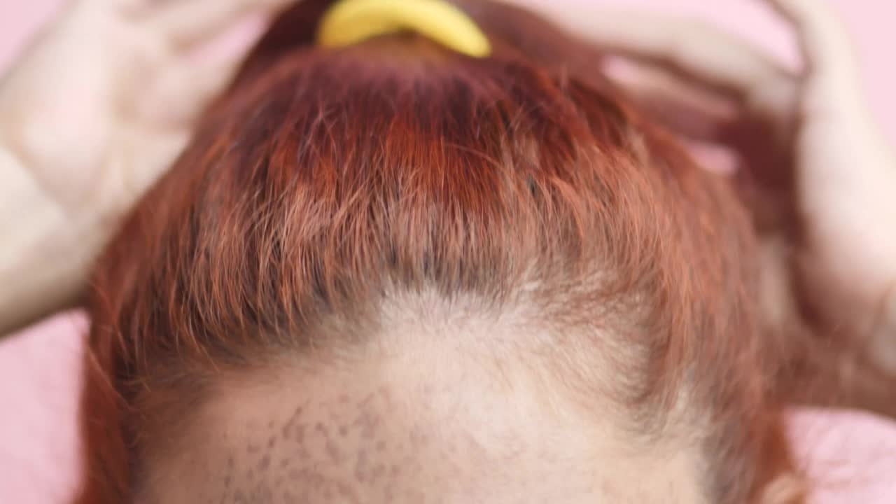 Stock Video Girl Combing Her Hair Looking Straight At The Camera Live Wallpaper For PC