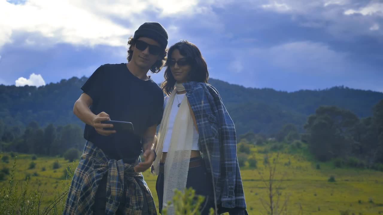 Stock Video Girl And Boy Taking A Selfie On A Natural Landscape Live Wallpaper For PC