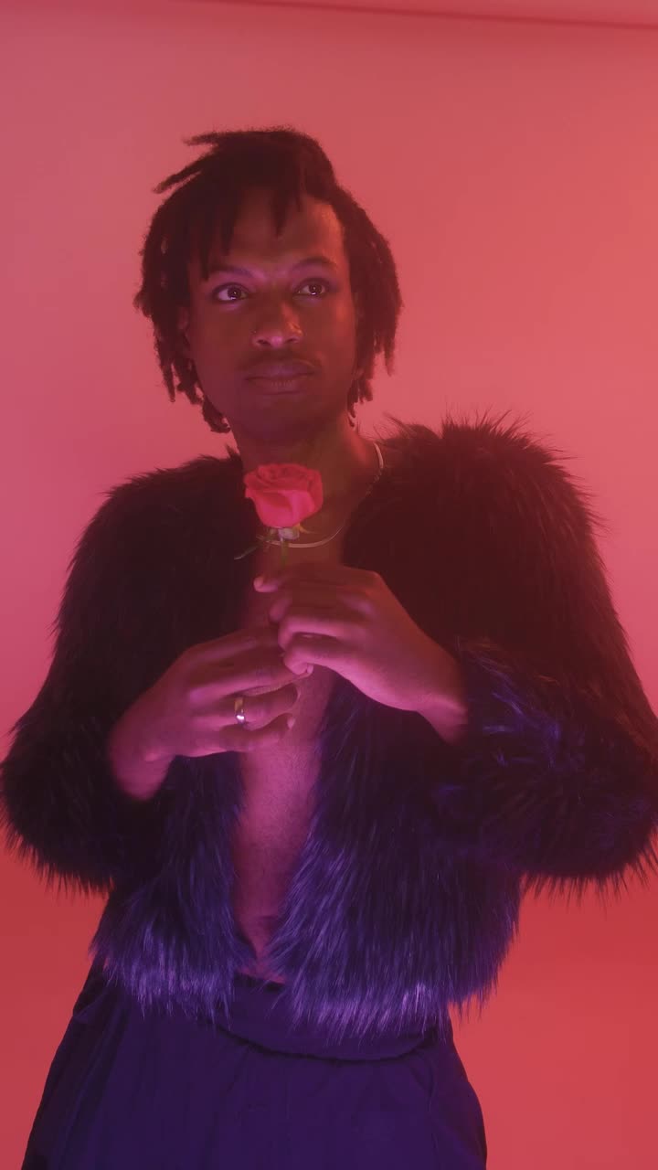 Stock Video Gay Man With A Flower On A Pink Background Live Wallpaper For PC