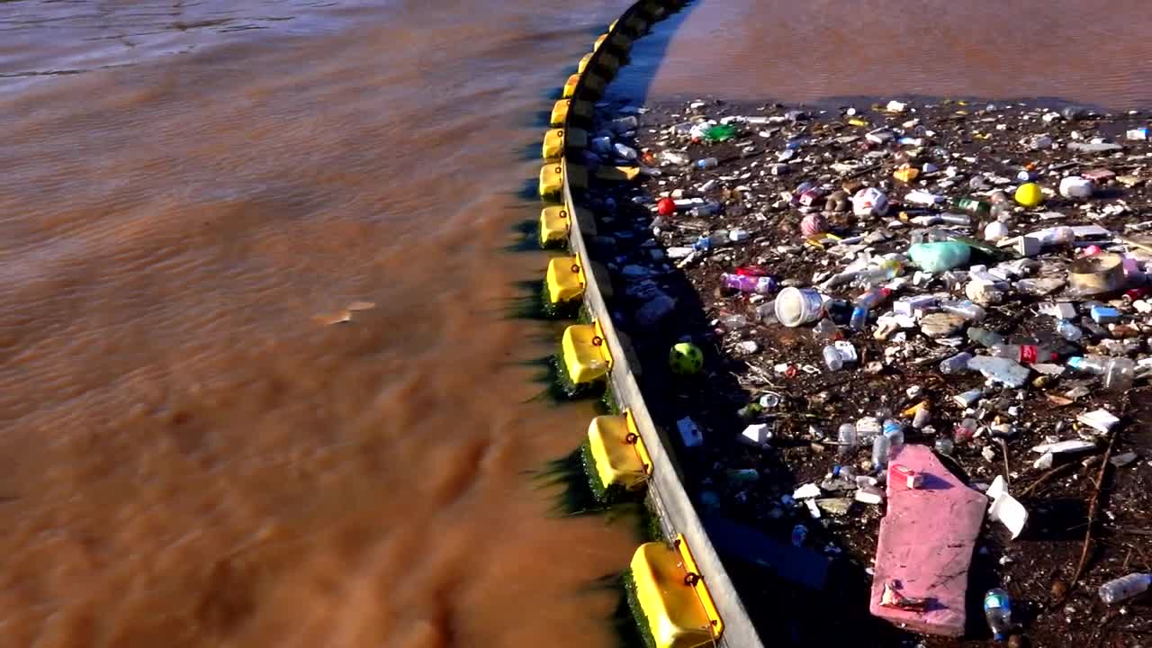 Stock Video Garbage Polluting The Water Of A Lake Live Wallpaper For PC