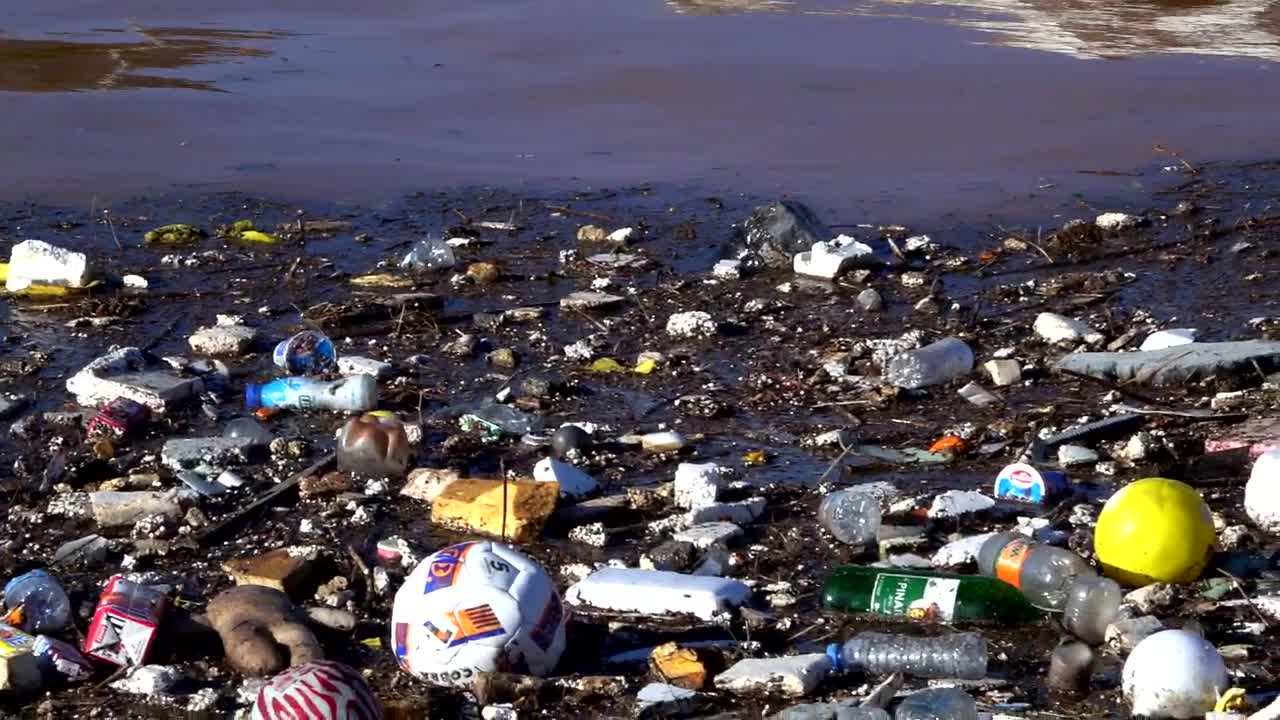 Stock Video Garbage Floating In A Polluted Lake Live Wallpaper For PC
